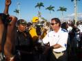 Pahokee's Principal presents the Muck Bowl Trophy to Belle Glades Central